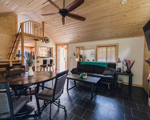 Cabin living room with vaulted wood ceiling